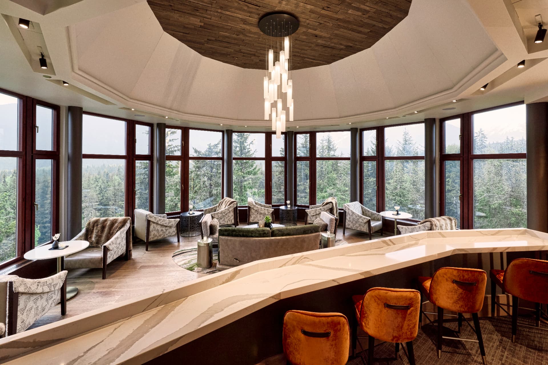 Black Diamond Lounge with floor to ceiling windows facing the forest